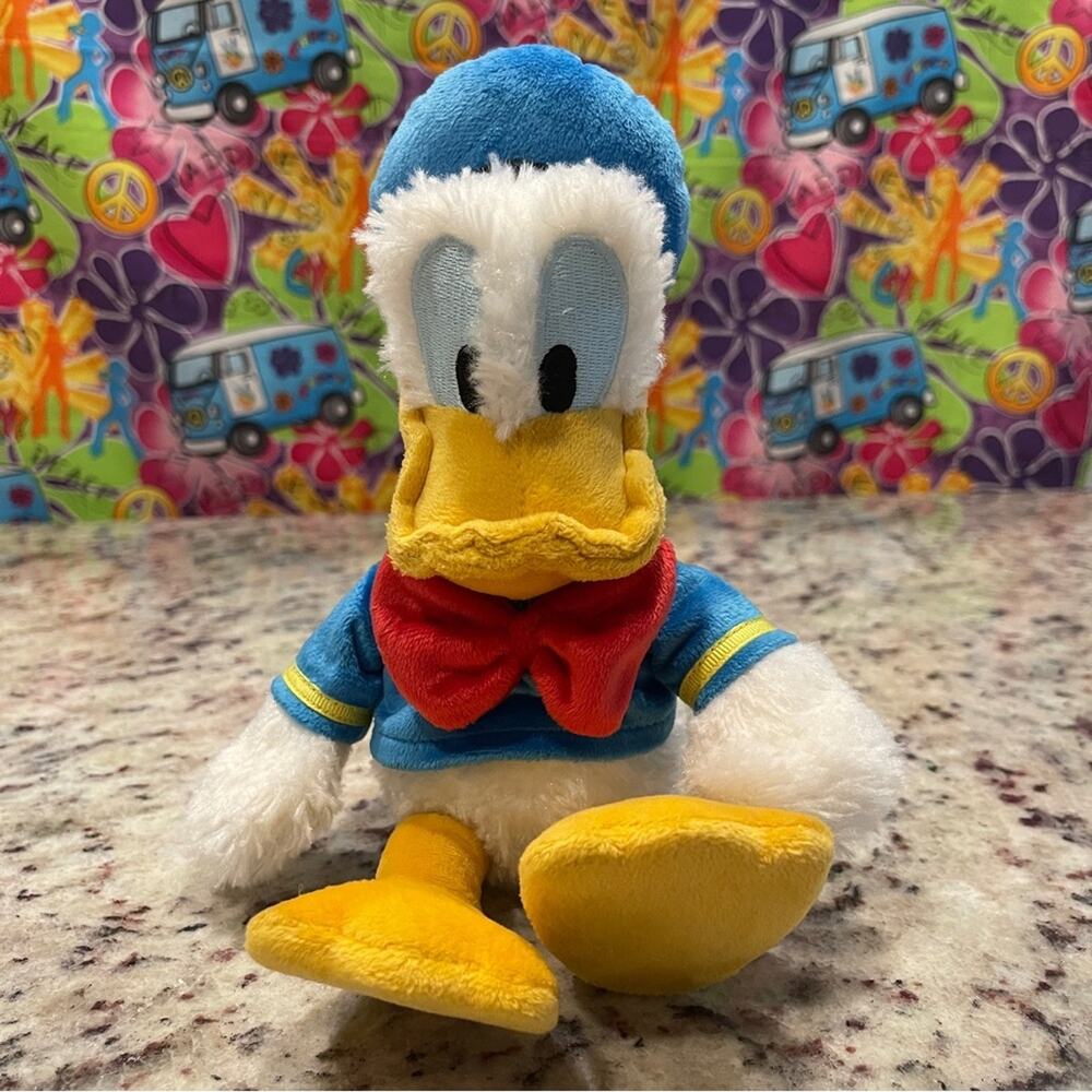 Disneyland Disney World Donald Duck 11" Plush with Yellow and White